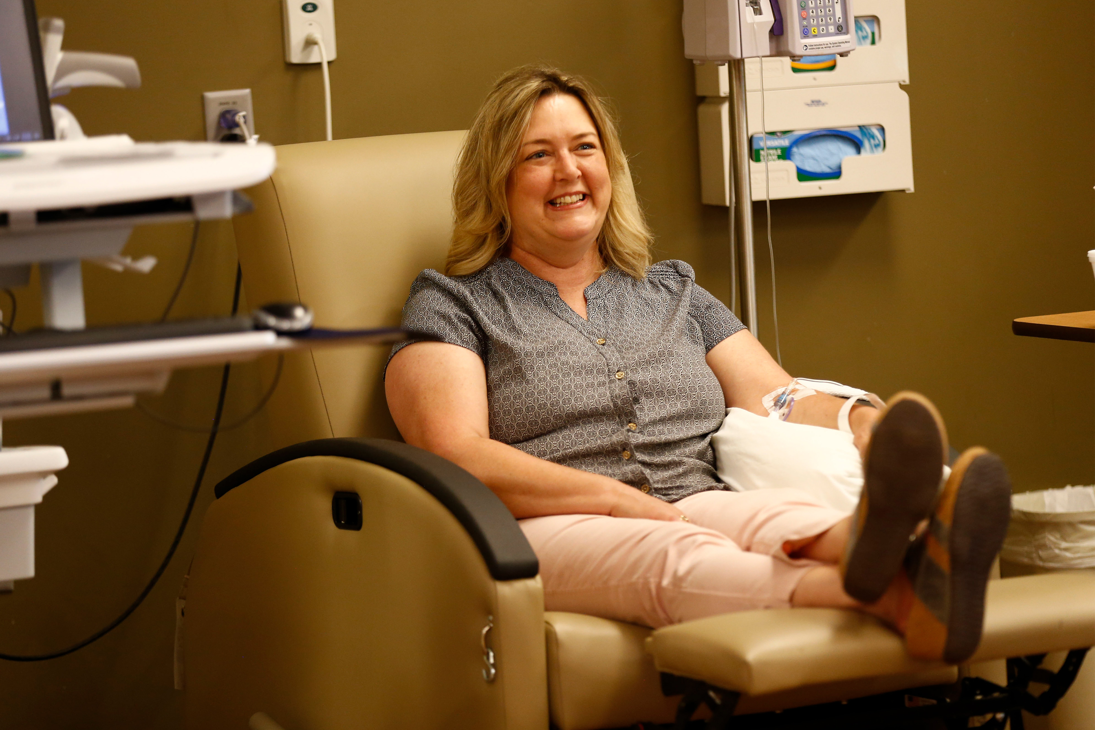 A photo of Paula Bruton Shepard receiving an infusion in a hospital.